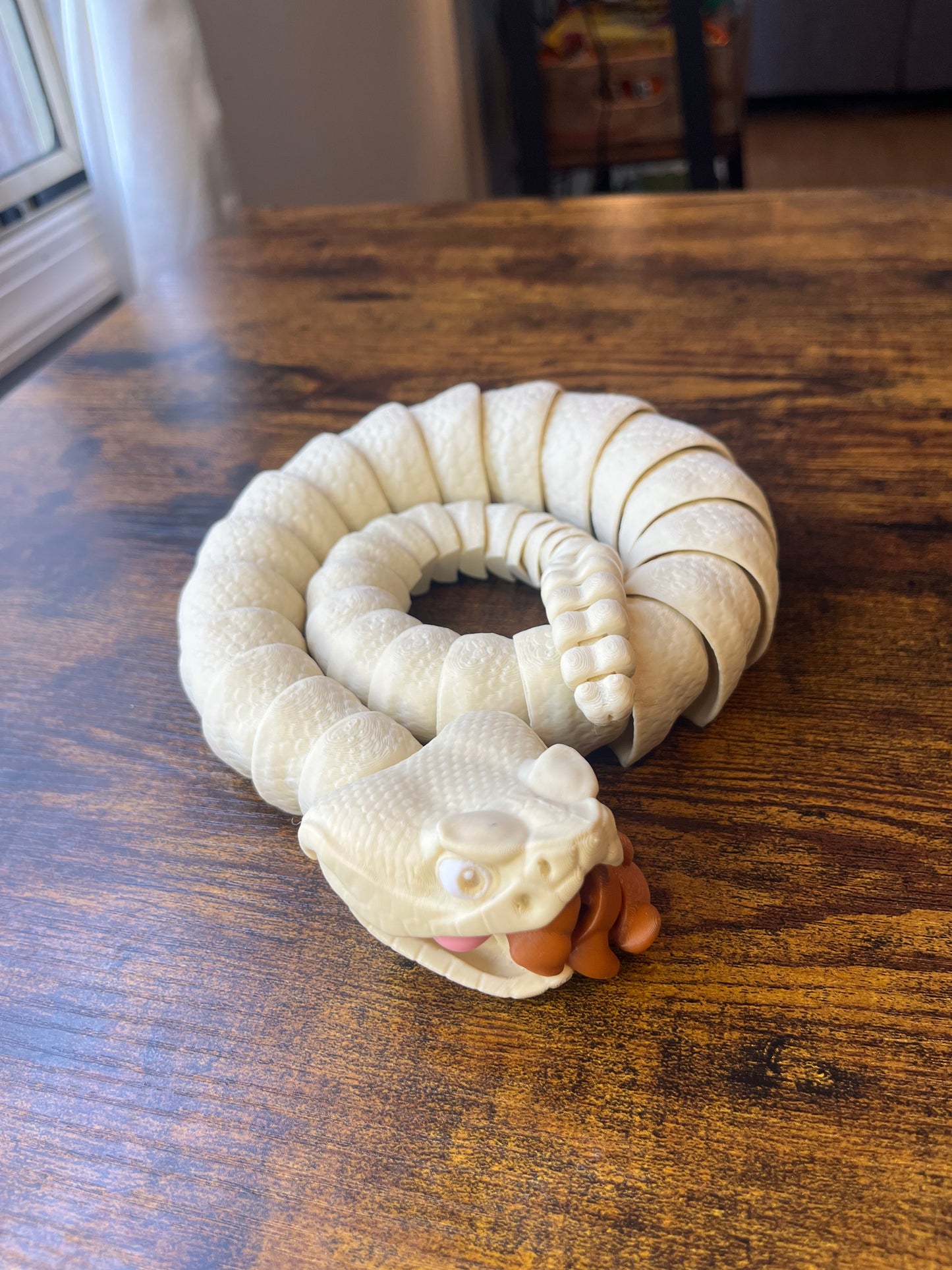 Articulated rattlesnake fidget/flexi