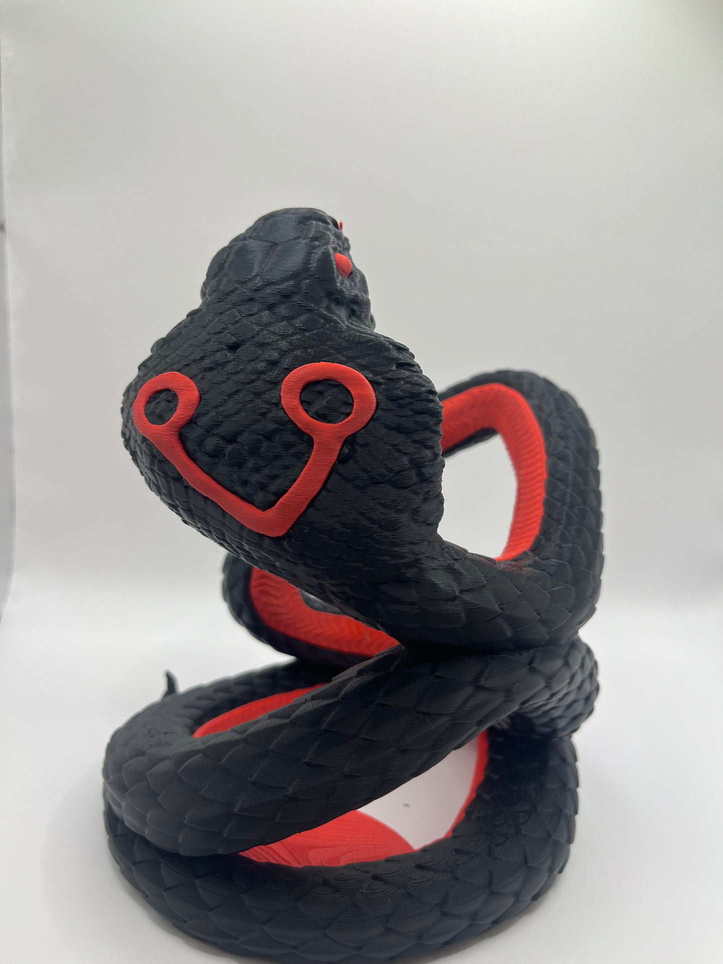 Cobra wine holder
